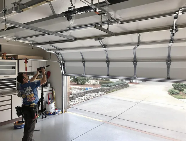 Garage door track repair service by Canton Garage Door Repair in Canton